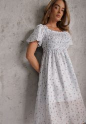 Niebieska Rozkloszowana Sukienka z Tencelu w Stylu Baby Doll w Kwiatowy Print Harele. Niebieskie sukienki dla dziewczynek Renee, na lato, bez wzorów, bez ramiączek, krótkie. Za 119.99 zł.