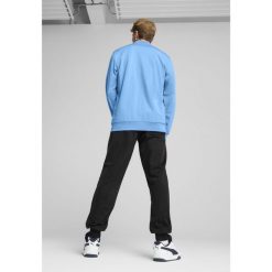 Męski dres inspirowany koszykówką z poliestru PUMA Team Light Blue. Niebieskie buty sportowe męskie Puma, z dresówki, bez zapięcia, na fitness i siłownię. W wyprzedaży za 219.00 zł.
