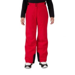 Isolowane spodnie narciarskie dla dziewczynki Rossignol. Czerwone buty zimowe dziewczęce Rossignol, bez wzorów, bez zapięcia. Za 419.99 zł.
