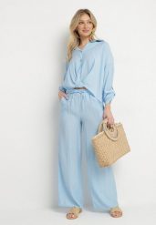 Jasnoniebieski Wiskozowy Komplet Oversize Koszula i Spodnie z Gumką w Talii Natilira. Niebieskie koszule damskie Born2be, l, bez wzorów, z wiskozy, biznesowe, bez kołnierzyka, bez ramiączek. Za 159.99 zł.