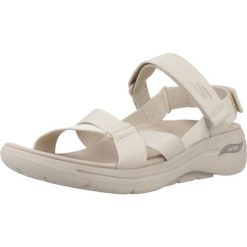 Sandały SKECHERS GO WALK ARCH FIT SANDAL Beżowy. Brązowe sandały damskie Skechers, bez wzorów, z tkaniny, bez obcasa, bez zapięcia. Za 490.00 zł.