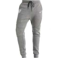 Nike Performance ENT ENGLAND Koszulka reprezentacji carbon heather/white. Spodnie sportowe męskie marki Nike Performance. Za 379.00 zł.