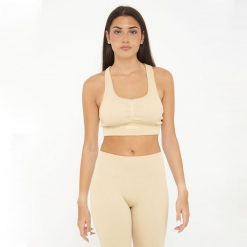Crop top treningowy ICONIC. Brązowe obuwie sportowe damskie Legea, bez wzorów, z elastanu, na fitness i siłownię. W wyprzedaży za 90.00 zł.