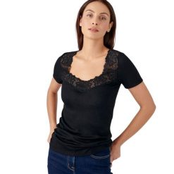 Koszulka damska Damart Thermolactyl. Czarne koszulki sportowe damskie DAMART, bez wzorów, ze skóry, bez kołnierzyka, bez ramiączek. Za 183.50 zł.