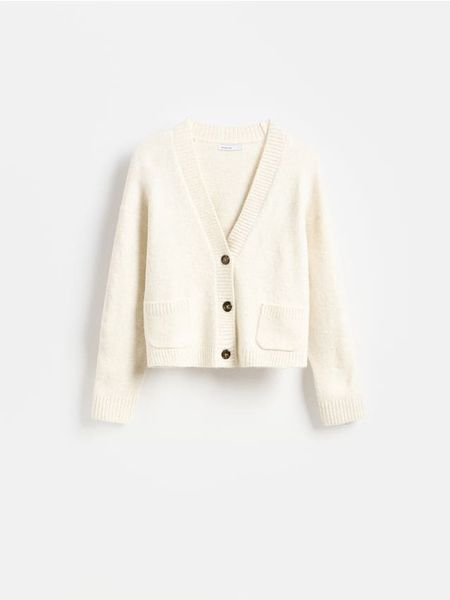 Kardigan z guzikami - kremowy. Białe kardigany damskie Reserved, l, bez wzorów, z dzianiny. Za 119.99 zł.
