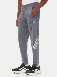 Adidas Spodnie dresowe Adi365 Iconic KS5806 Szary ciemny Regular Fit. Szare spodnie sportowe męskie Adidas, l, bez wzorów, z dresówki, do biegania. Za 237.99 zł.