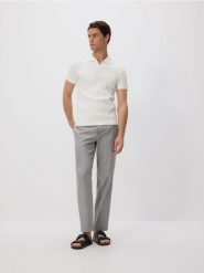 Spodnie chino regular z lnem - oliwkowy. Zielone spodnie materiałowe męskie Reserved, bez wzorów, z bawełny. Za 159.99 zł.