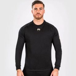 Longsleeve męski Venum UFC By Adrenaline Fight Week Dry-Tech. Czarne koszulki sportowe męskie VENUM, m, bez wzorów, bez kołnierzyka, bez ramiączek. Za 184.00 zł.