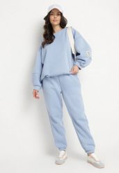 Niebieski Komplet Dresowy Bluza i Joggery Podszyte Polarem Zibea. Niebieskie bluzy damskie Born2be, bez wzorów, z bawełny, bez kaptura. Za 169.99 zł.