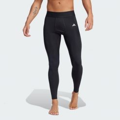 Legginsy TECHFIT Long. Czarne legginsy sportowe męskie Adidas, bez wzorów, z materiału, do piłki nożnej, techfit (adidas). Za 110.99 zł.