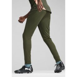 Męskie spodnie treningowe Manchester City PUMA Myrtle Bold Blue Green. Niebieskie spodnie sportowe męskie Puma, m, bez wzorów, do piłki nożnej. W wyprzedaży za 291.00 zł.