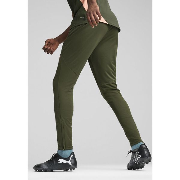 Męskie spodnie treningowe Manchester City PUMA Myrtle Bold Blue Green. Niebieskie spodnie sportowe męskie Puma, m, bez wzorów, do piłki nożnej. W wyprzedaży za 291.00 zł.