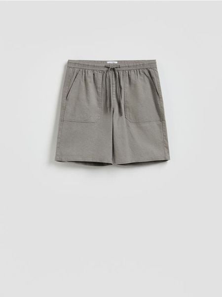 Szorty jogger regular fit - jasnoszary. Szare szorty męskie Reserved, l, bez wzorów, z bawełny. W wyprzedaży za 35.99 zł.