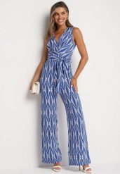 Niebieski Taliowany Kombinezon z Głębokim Dekoltem Przewiązywany w Pasie Vimashane. Niebieskie sukienki damskie Born2be, na co dzień, l, bez wzorów, eleganckie, bez kołnierzyka, bez ramiączek, proste. Za 139.99 zł.