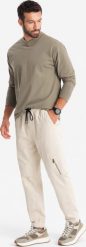 Ombre Dzianinowe męskie joggery z kieszeniami cargo kremowe V1 OM-PAJO-0199 M. Białe spodnie sportowe męskie Ombre, m, bez wzorów, z dzianiny. Za 239.99 zł.