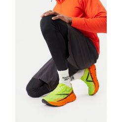 Buty do biegania Reebok. Żółte buty sportowe męskie Reebok, bez zapięcia, do biegania. Za 400.99 zł.