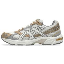 Trampki Asics Sr. Szare trampki i tenisówki damskie Asics, bez wzorów, z materiału, eleganckie, bez zapięcia. Za 710.99 zł.