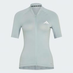 Koszulka Do Jazdy Na Rowerze Essentials. Zielone koszulki sportowe damskie Adidas, bez wzorów, bez kołnierzyka, bez ramiączek, rowerowe, climacool (adidas). Za 299.00 zł.