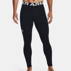 Under Armour UA CG ARMOUR LEGGINGS Legginsy męskie. Czarne legginsy sportowe męskie Under Armour, l, bez wzorów, ze skóry, do biegania. Za 239.00 zł.