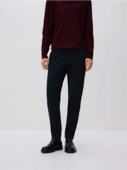 Spodnie chino slim fit - granatowy. Niebieskie spodnie materiałowe męskie Reserved, bez wzorów, z lyocellu. Za 149.99 zł.
