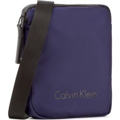 Saszetka CALVIN KLEIN - Blithe Mini Reporter K50K503448 426. Saszetki męskie marki Calvin Klein. W wyprzedaży za 219.00 zł.