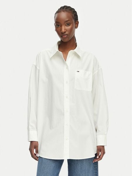 Tommy Jeans Koszula Essential DW0DW22936 Biały Oversize. Białe bluzki damskie Tommy Jeans, l, bez wzorów, z bawełny, bez kołnierzyka, bez ramiączek. Za 449.99 zł.