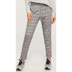 Wzorzyste spodnie - Szary. Spodnie materiałowe damskie marki Reserved. Za 79.99 zł.