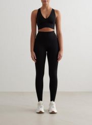 Damskie legginsy z wysokim stanem, squat proof, modelujące Sculpting Fit czarne. Czarne legginsy damskie Aim'n, l, bez wzorów, z lycry, z podwyższonym stanem, do biegania. Za 424.00 zł.