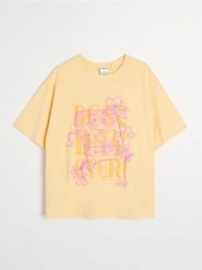 Bawełniana koszulka z nadrukiem SpongeBob - żółty. Żółte t-shirty damskie Sinsay, l, bez wzorów, z bawełny, bez kołnierzyka. Za 29.99 zł.