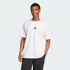 Koszulka Codes Photoreal Graphic. Brązowe buty sportowe męskie Adidas, z bawełny, bez zapięcia, na fitness i siłownię. Za 129.00 zł.