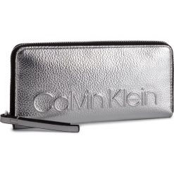 Duży Portfel Damski CALVIN KLEIN - Edged Large Ziparound Met K60K605176 068. Portfele damskie marki Calvin Klein. Za 299.00 zł.