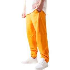 Spodnie Urban Classics basic. Brązowe spodnie materiałowe męskie Urban Classics, m, bez wzorów. Za 198.50 zł.