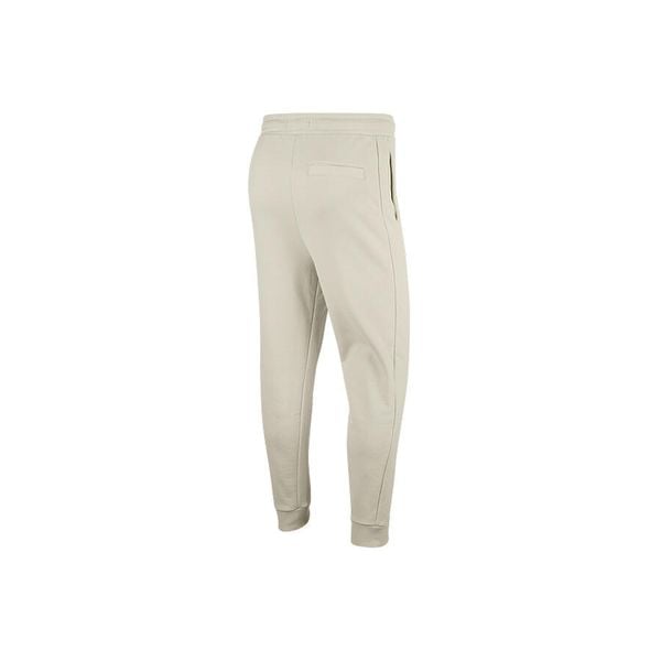 Spodnie męskie nike air jordan flight loopback pants light bone. Brązowe spodnie sportowe męskie Nike, m, bez wzorów, z dresówki, do koszykówki. Za 369.00 zł.