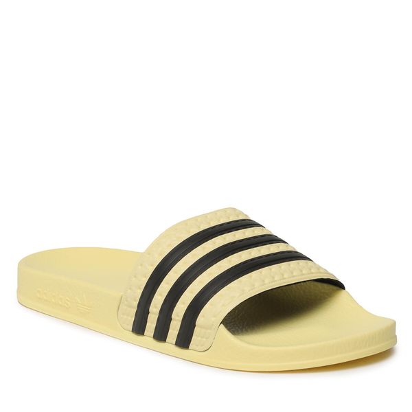 Klapki adidas. Żółte buty sportowe męskie Adidas, bez zapięcia. Za 199.99 zł.