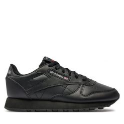 Sneakersy Reebok. Czarne trampki i tenisówki chłopięce Reebok, bez wzorów, bez zapięcia. Za 179.99 zł.