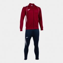 Dziecięcy dres Joma Championship VII. Białe spodnie sportowe dla chłopców Joma, bez wzorów, z dresówki, sportowe, na fitness i siłownię. Za 247.55 zł.