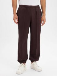 Lacoste spodnie dresowe Mężczyźni brązowy, 5. Brązowe spodnie sportowe męskie Lacoste, l, bez wzorów, z dresówki. Za 699.95 zł.