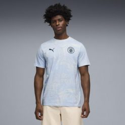 Męska koszulka Manchester City ftblCulture Printed PUMA. Niebieskie koszulki sportowe męskie Puma, m, bez wzorów, bez kołnierzyka, bez ramiączek, do biegania. Za 149.00 zł.