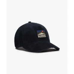 Damska czapka typu trucker Superdry. Niebieskie czapki i kapelusze damskie Superdry., bez wzorów. Za 148.20 zł.