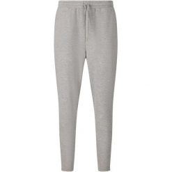 Damskie spodnie dresowe Athlecia Jacey V2. Szare spodnie dresowe damskie Athlecia, bez wzorów, z dresówki. Za 249.00 zł.