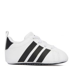 Niechodki adidas. Białe trampki i tenisówki chłopięce Adidas, bez wzorów, bez zapięcia. Za 109.99 zł.