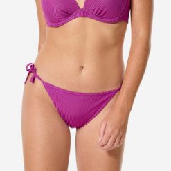Dół kostiumu kąpielowego damski Decathlon Sandy Folk. Fioletowe bikini damskie Decathlon, bez wzorów. Za 49.99 zł.
