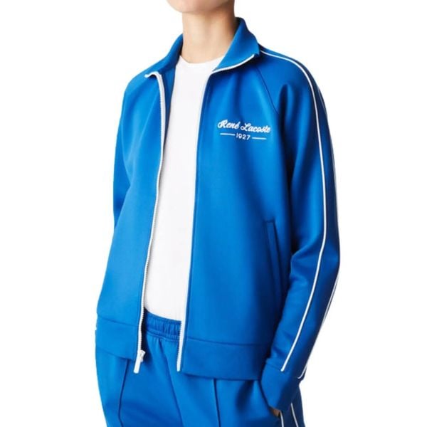 Bluza damska Lacoste SF7094. Niebieskie bluzy damskie Lacoste, xs, bez wzorów, z elastanu, bez kaptura. Za 392.00 zł.