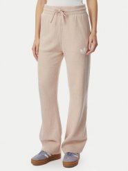 Adidas Spodnie dresowe Essentials KR9180 Beżowy Loose Fit. Brązowe spodnie dresowe damskie Adidas, xs, bez wzorów, z dresówki. Za 299.99 zł.