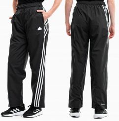 Spodnie damskie adidas Future Icons Three Stripes Woven. Czarne spodnie sportowe damskie Adidas, l, bez wzorów, z materiału, na fitness i siłownię. Za 229.99 zł.
