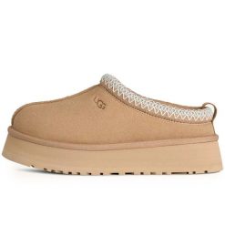 Damskie buty sportowe W TAZZ II. Brązowe obuwie sportowe damskie UGG, bez wzorów, z materiału. Za 776.55 zł.