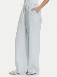 Tommy Jeans Spodnie materiałowe DW0DW22285 Niebieski jasny Loose Fit. Niebieskie jeansy damskie Tommy Jeans, l, bez wzorów, z jeansu. Za 409.99 zł.