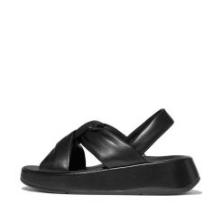 Sandały damskie FitFlop F-Mode Knot Soft-Leather Flatform B/Strap. Czarne sandały damskie Flip Flop, bez wzorów, ze skóry, bez obcasa, na płaskiej podeszwie, bez zapięcia. Za 583.80 zł.