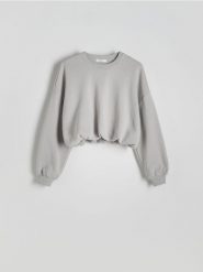 Krótka bluza ze ściągaczem - jasnoszary. Szare bluzy damskie Reserved, l, bez wzorów, z bawełny, bez kaptura. W wyprzedaży za 49.99 zł.