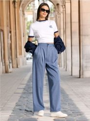 Spodnie - niebieski. Niebieskie spodnie materiałowe damskie Sinsay, l, bez wzorów, z materiału. Za 69.99 zł.